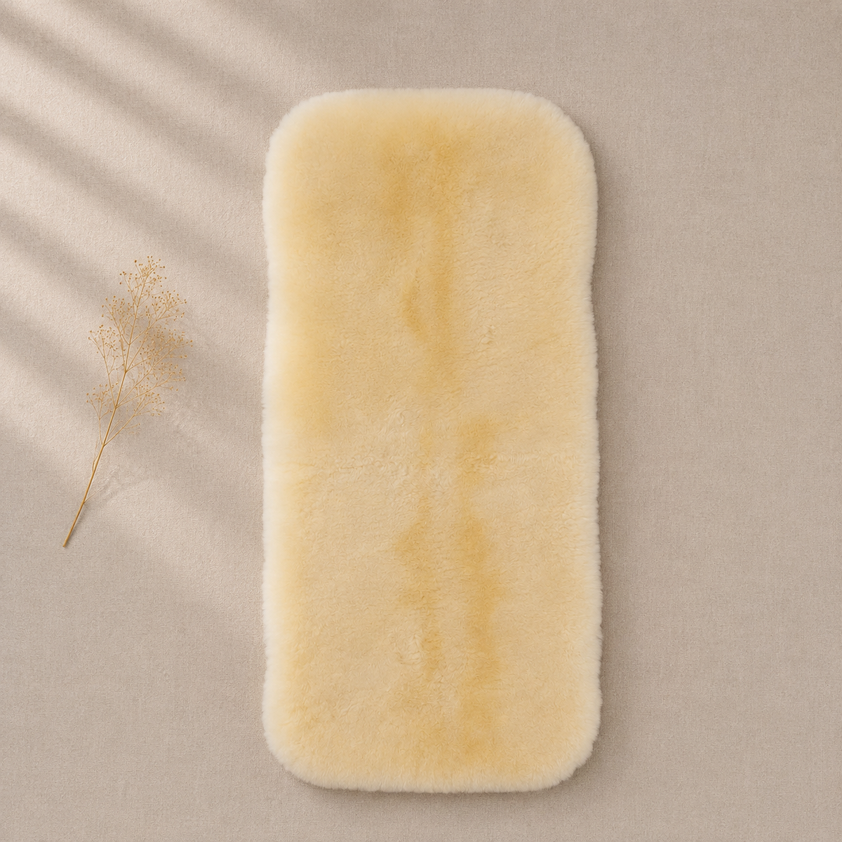 Colchoncito de piel de oveja para bebé | Baby-Care para capazo y colecho